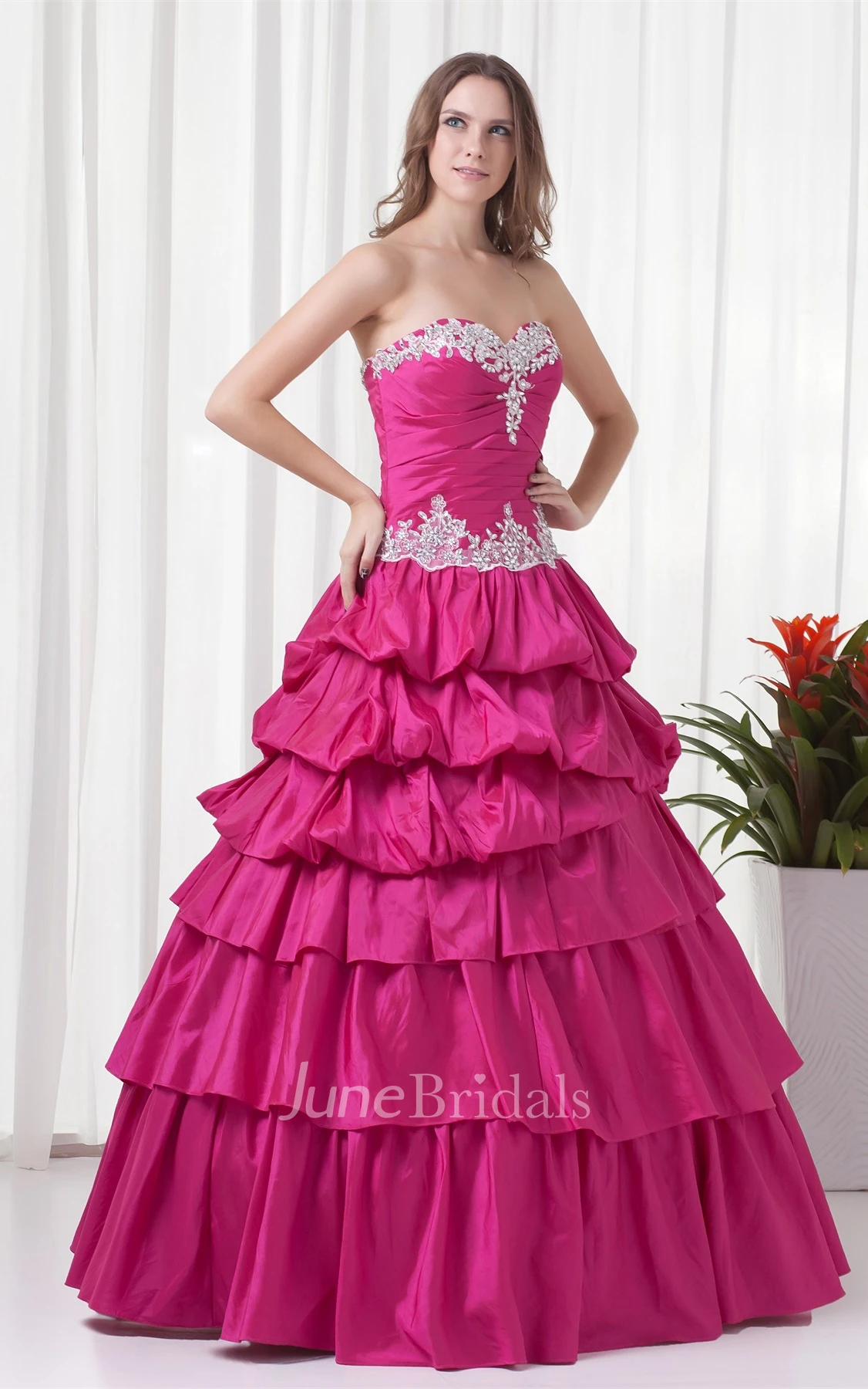 sweetheart a-line ball tiered gown with ruching and appliques