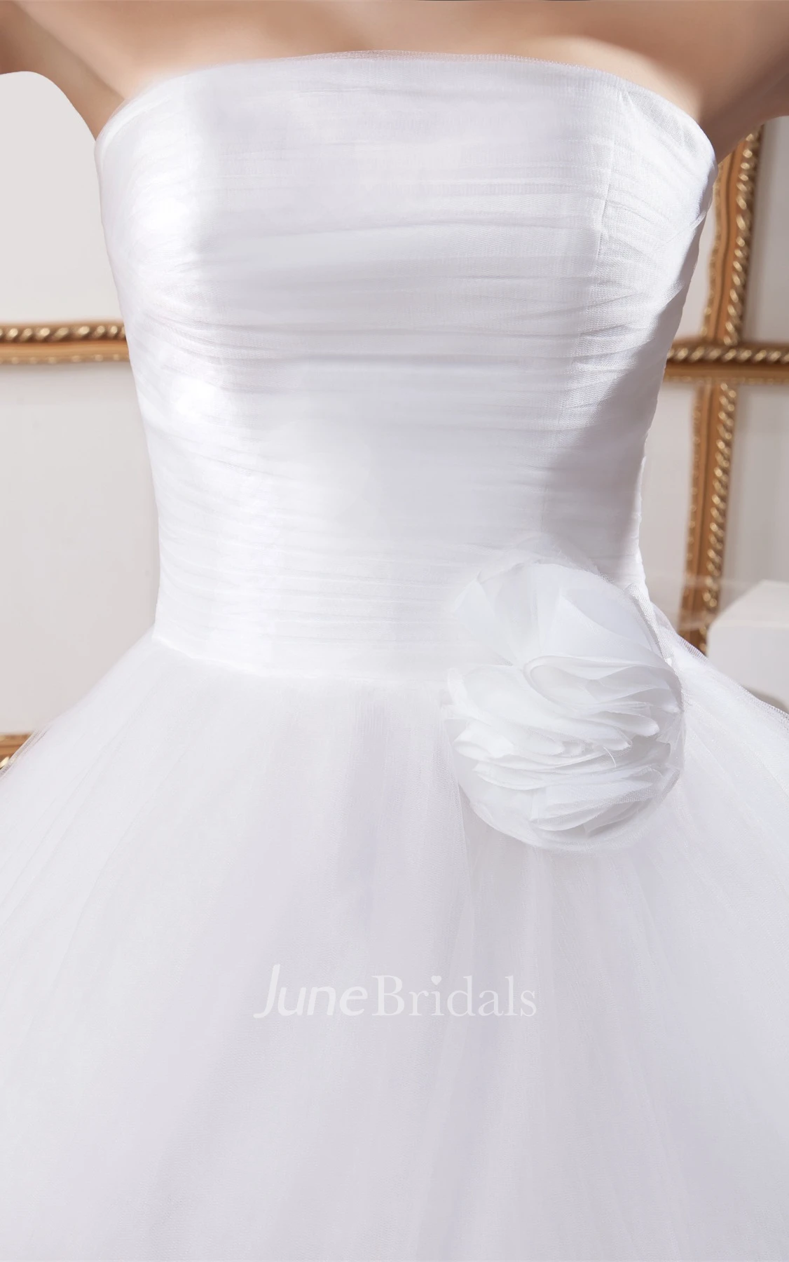 Strapless Tulle Ball Gown with Tiers and Flower