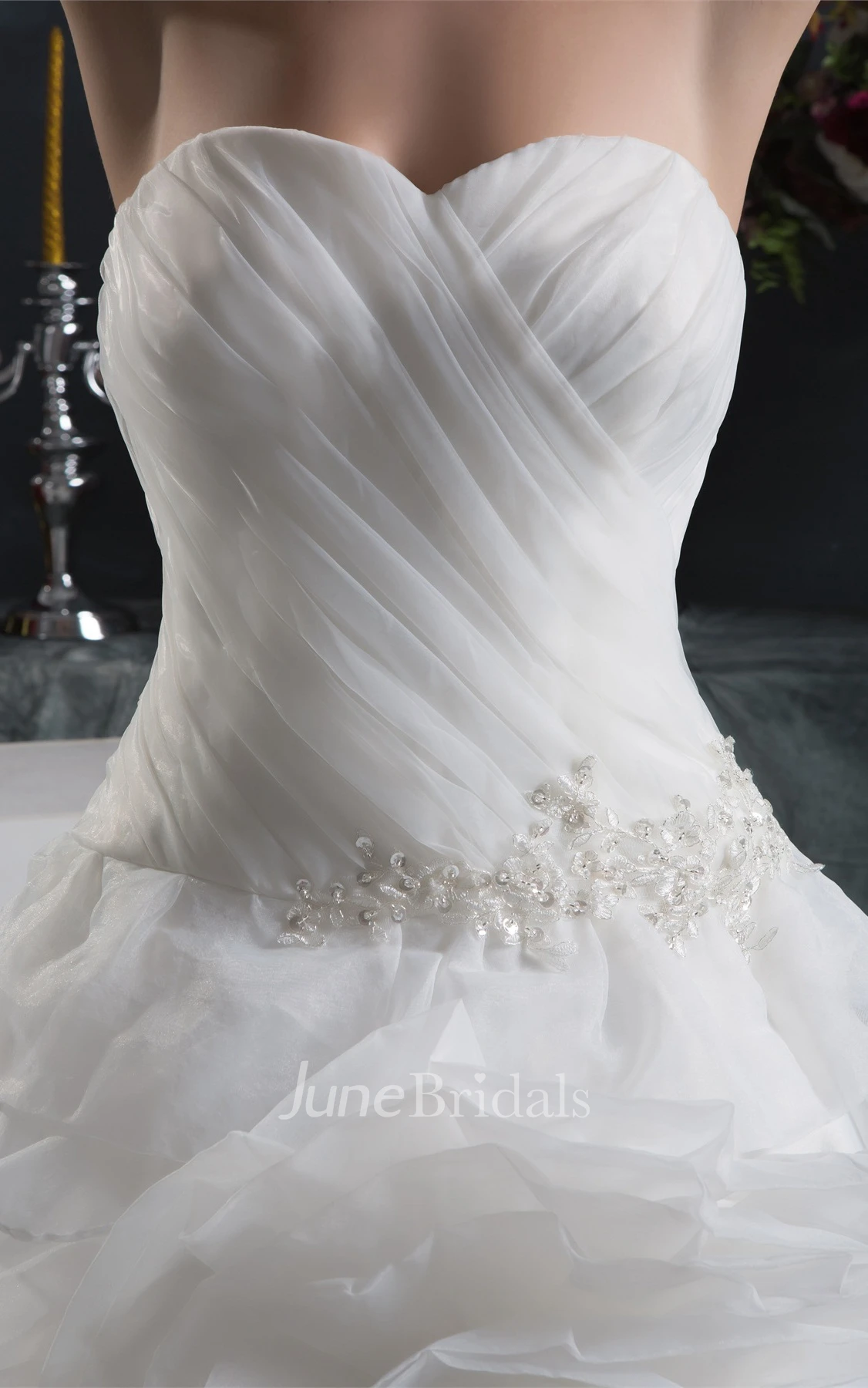 Sweetheart Criss-Cross Ball Gown with Ruffled Skirt and Stress