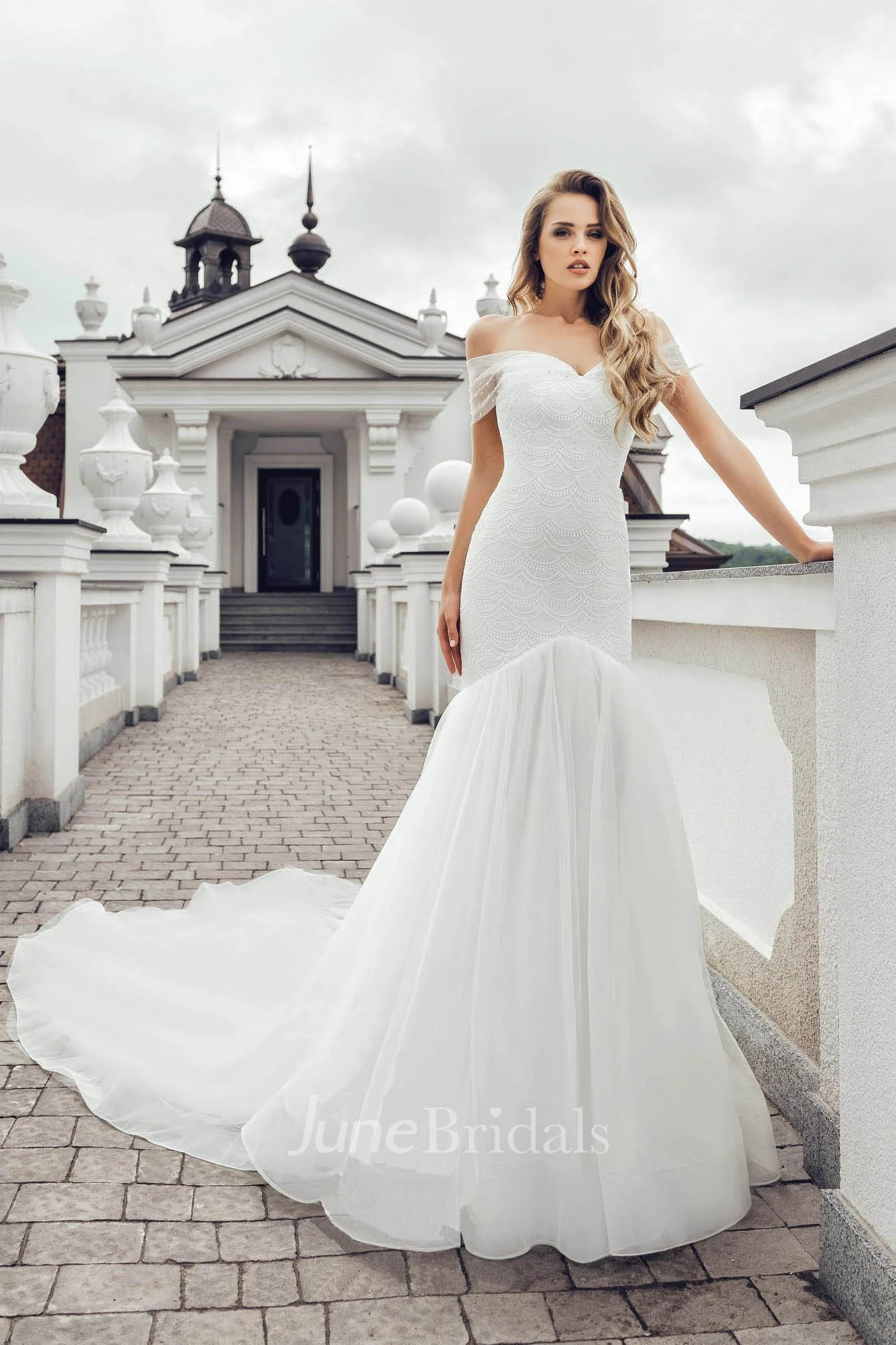 Elegant Off-the-shoulder Short Sleeve Wedding Dress with Chapel Train
