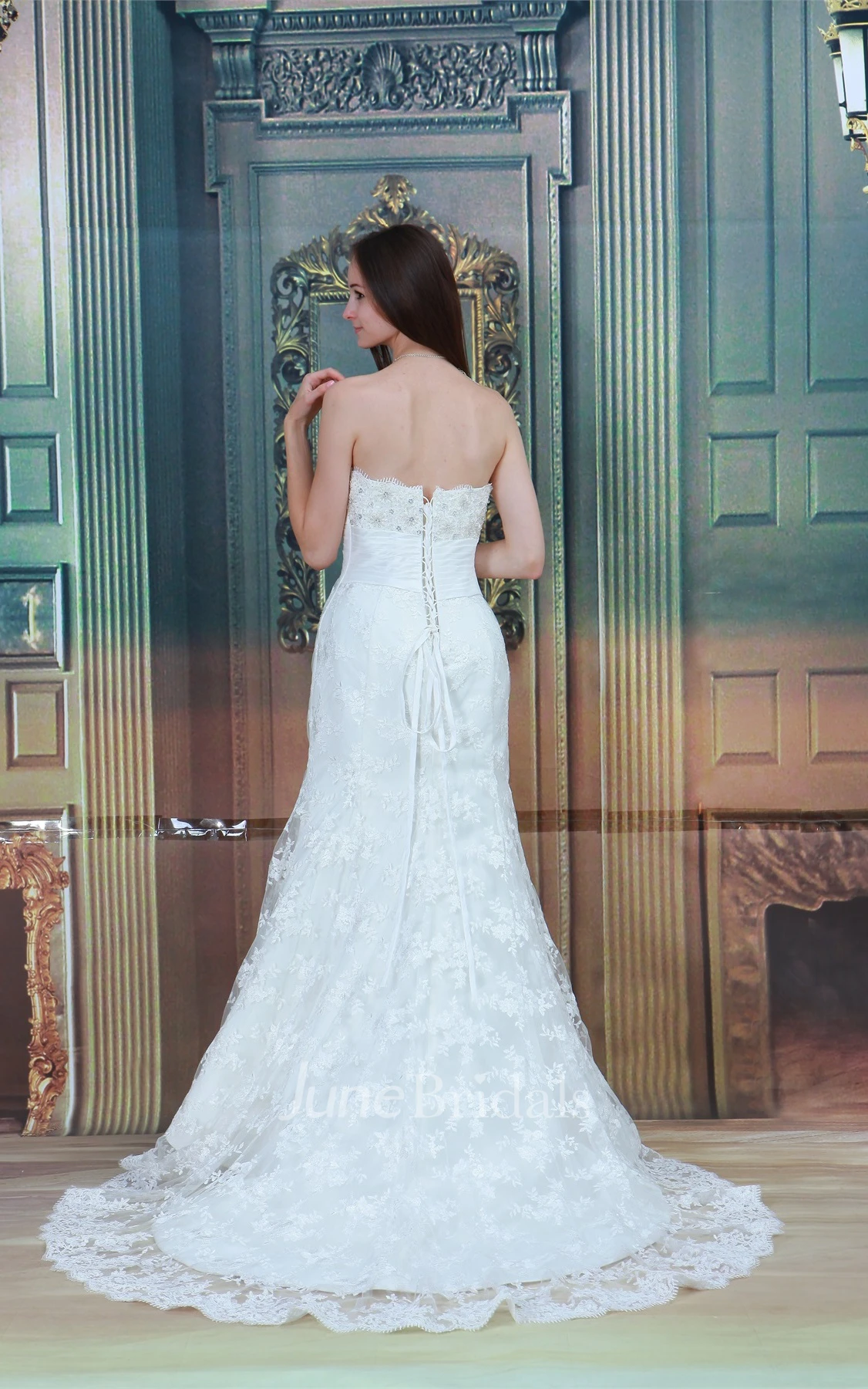 strapless a-line mermaid gown with bow and central ruching