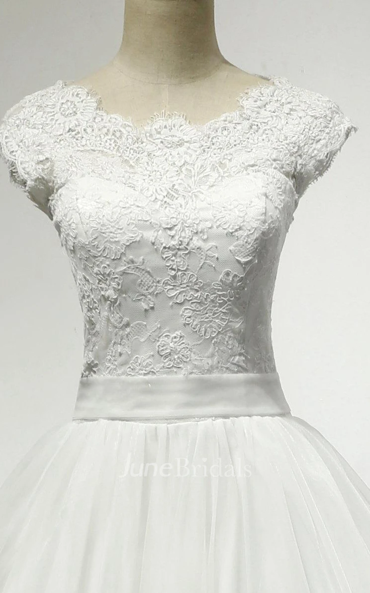 Jewel Neck Cap Sleeve Tulle Ball Gown With Scalloped Hem