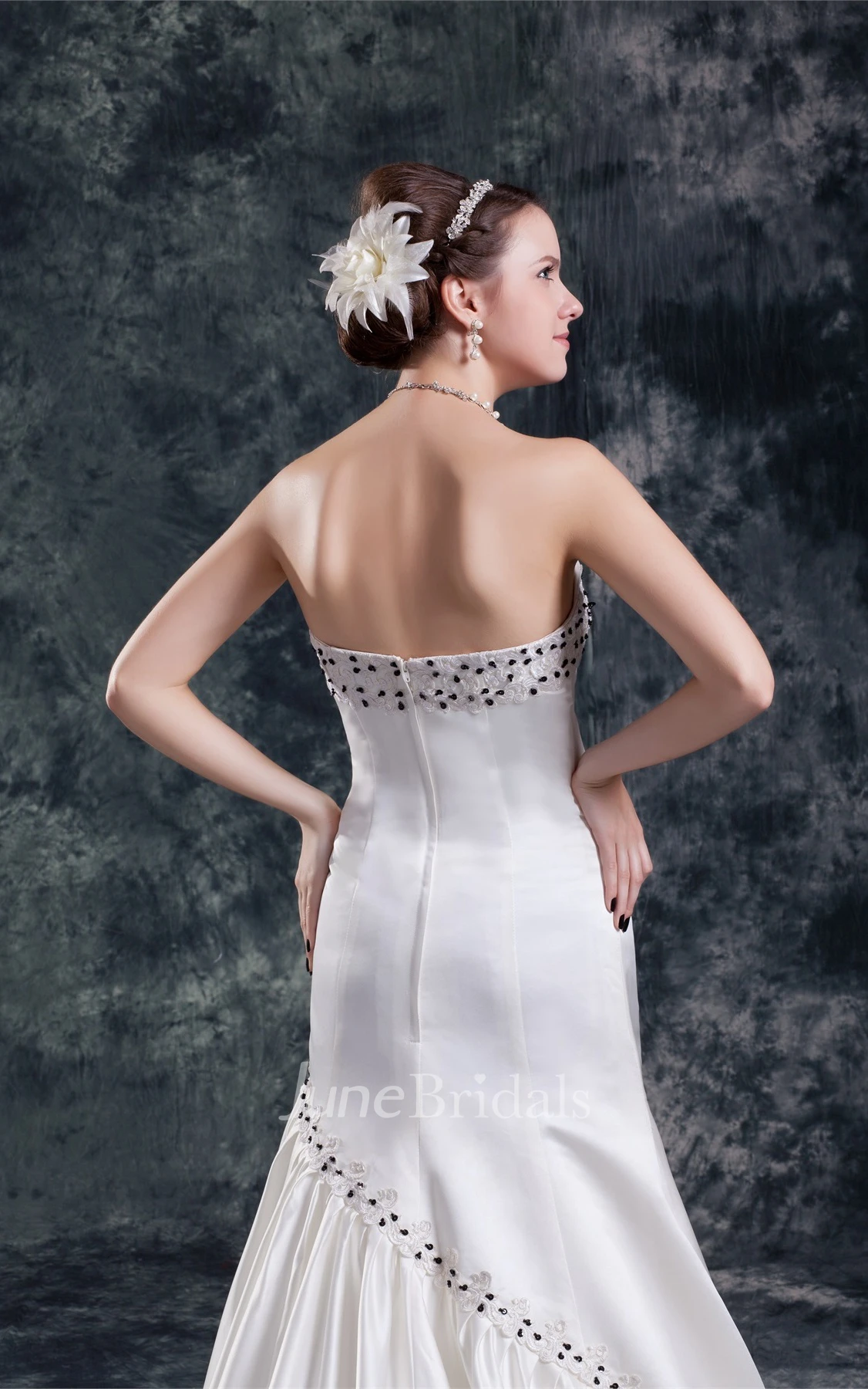 strapless draped a-line satin gown with appliques and beading