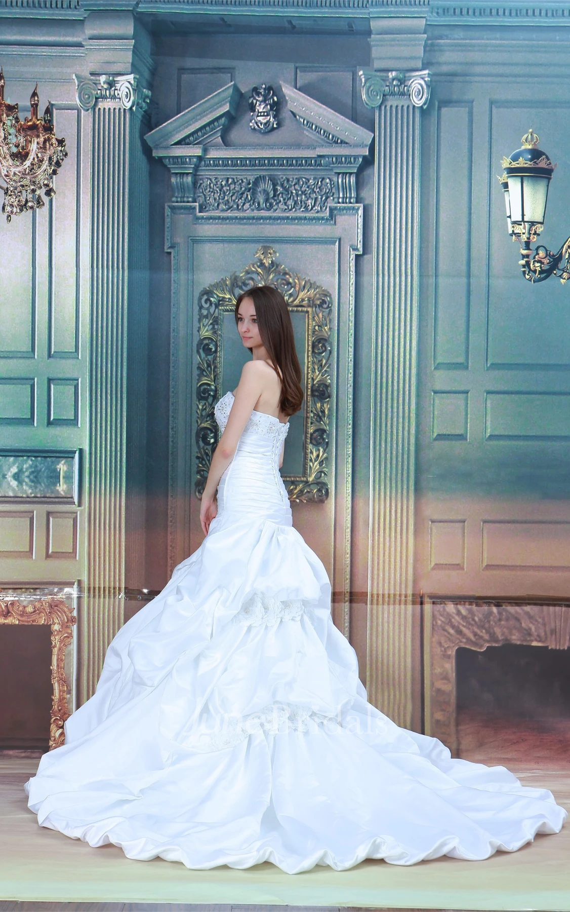 strapless a-line ball ruffled gown with appliques and beading