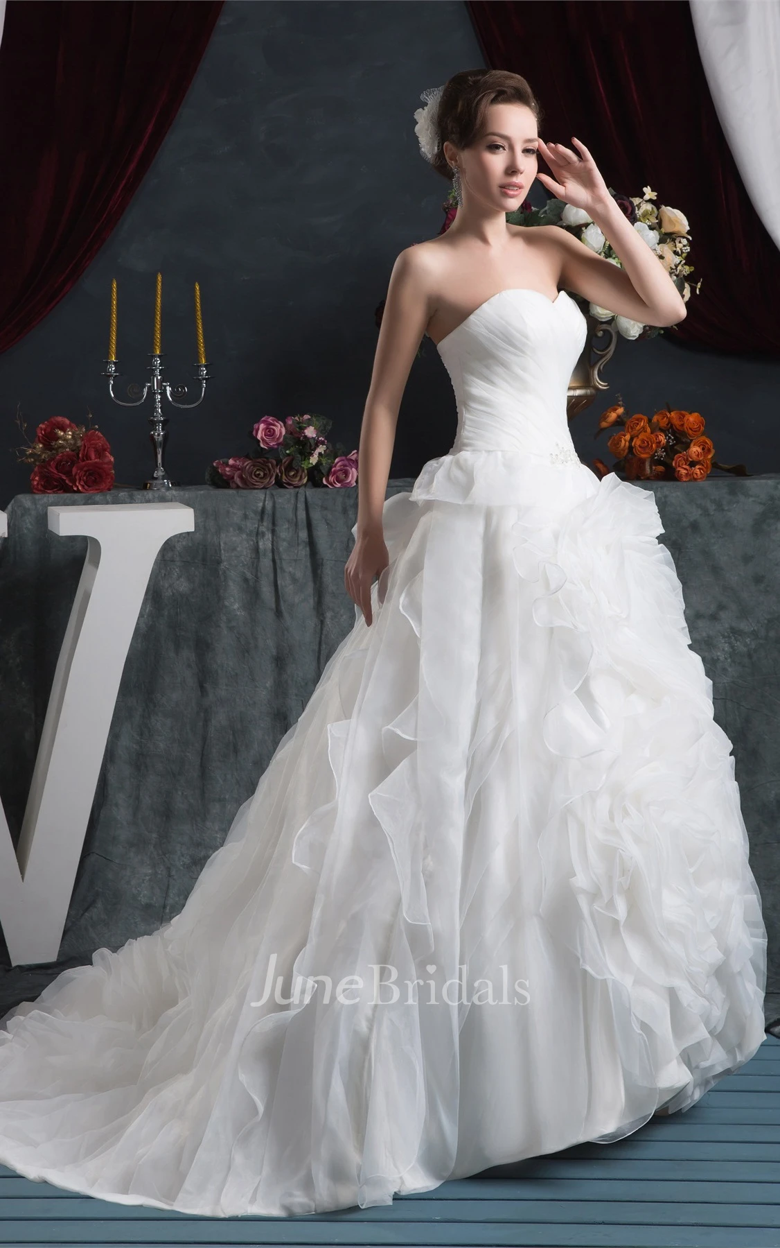 Sweetheart Criss-Cross Ball Gown with Ruffled Skirt and Stress