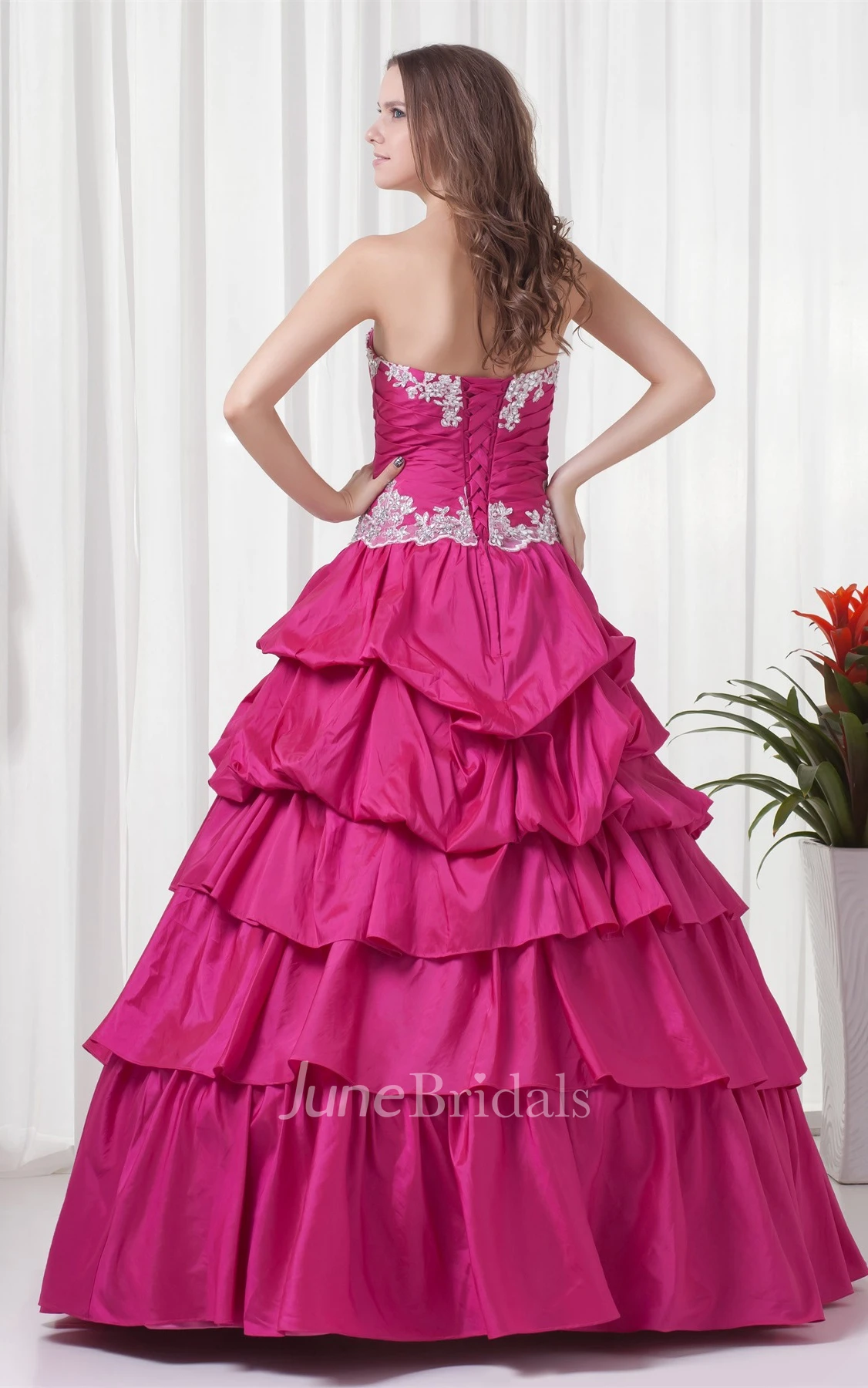 sweetheart a-line ball tiered gown with ruching and appliques