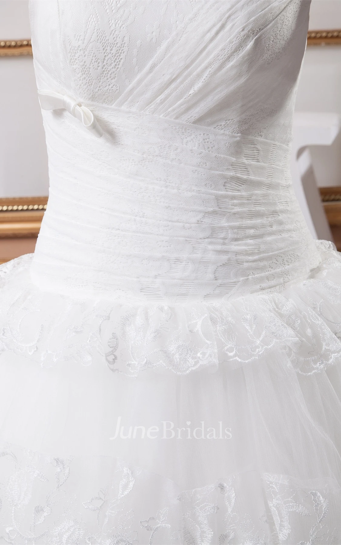 Strapless Tulle Ball Gown with Peplum and Appliques