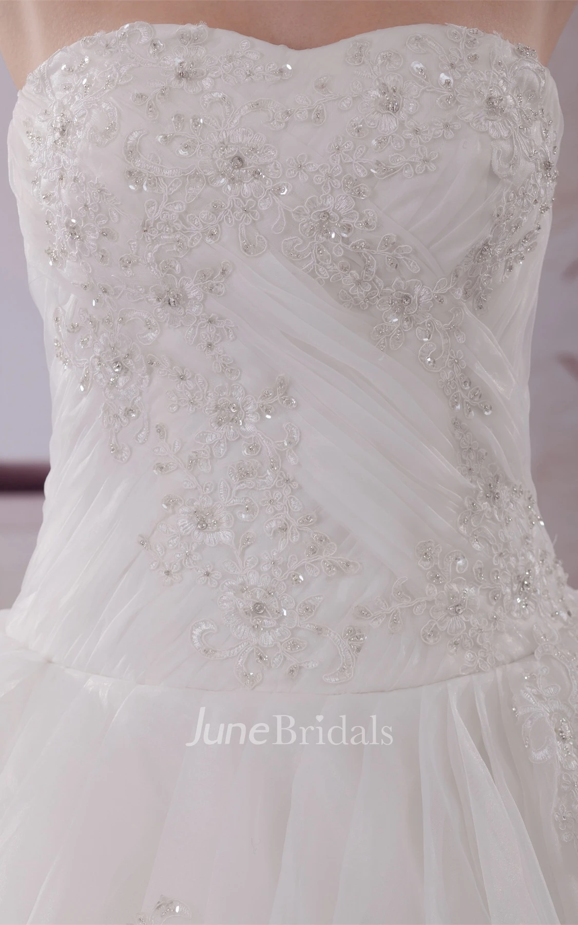 Strapless Appliqued Ball Gown with Ruching and Corset Back