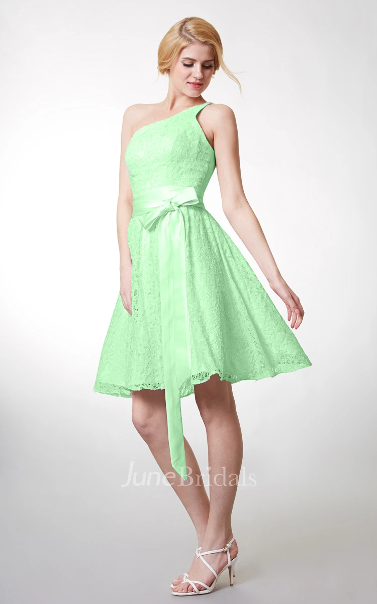 Beautiful Knee Length Lace Dress One Shoulder Neckline and Fitted Cut Flattering