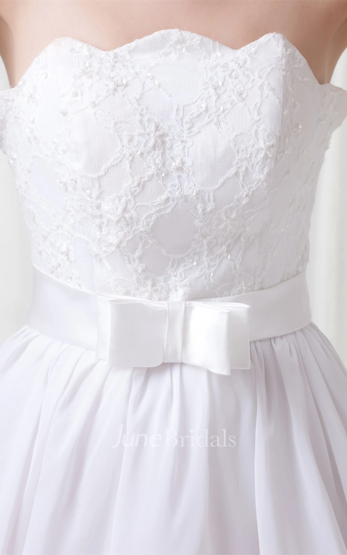 strapless tiered a-line dress with appliques and bow