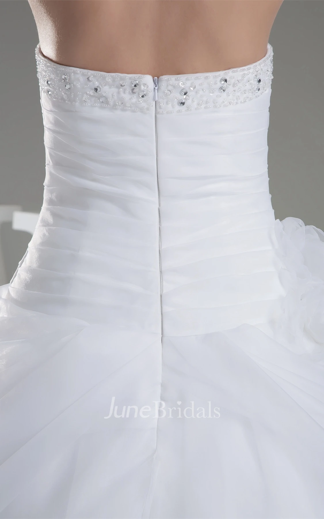 Strapless Ruched Jeweled Ball Gown with Flower and Ruffles