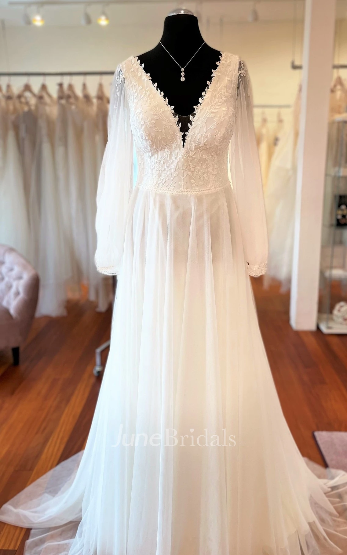 Romantic A-Line Tulle Spring Wedding Dress With Illusion Long Sleeves And Keyhole Back