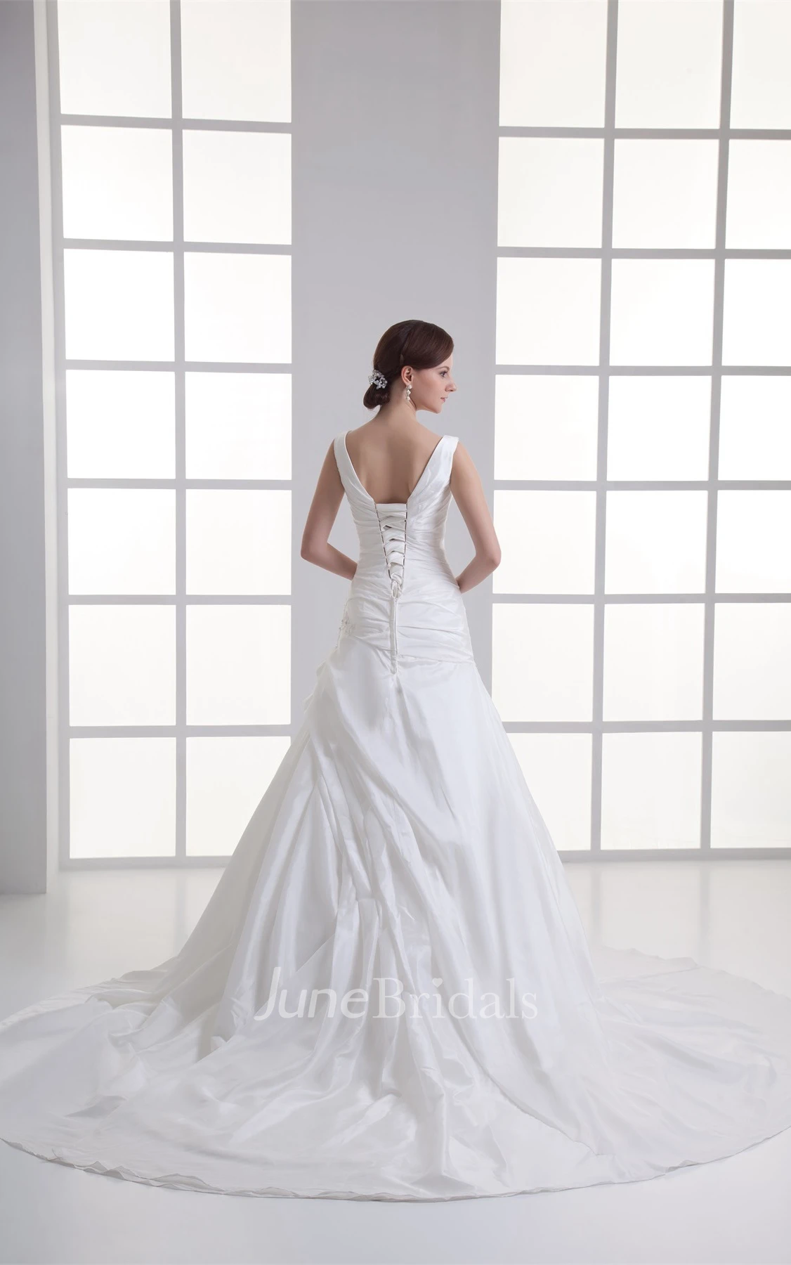 strapped pleated a-line gown with corset back and beading