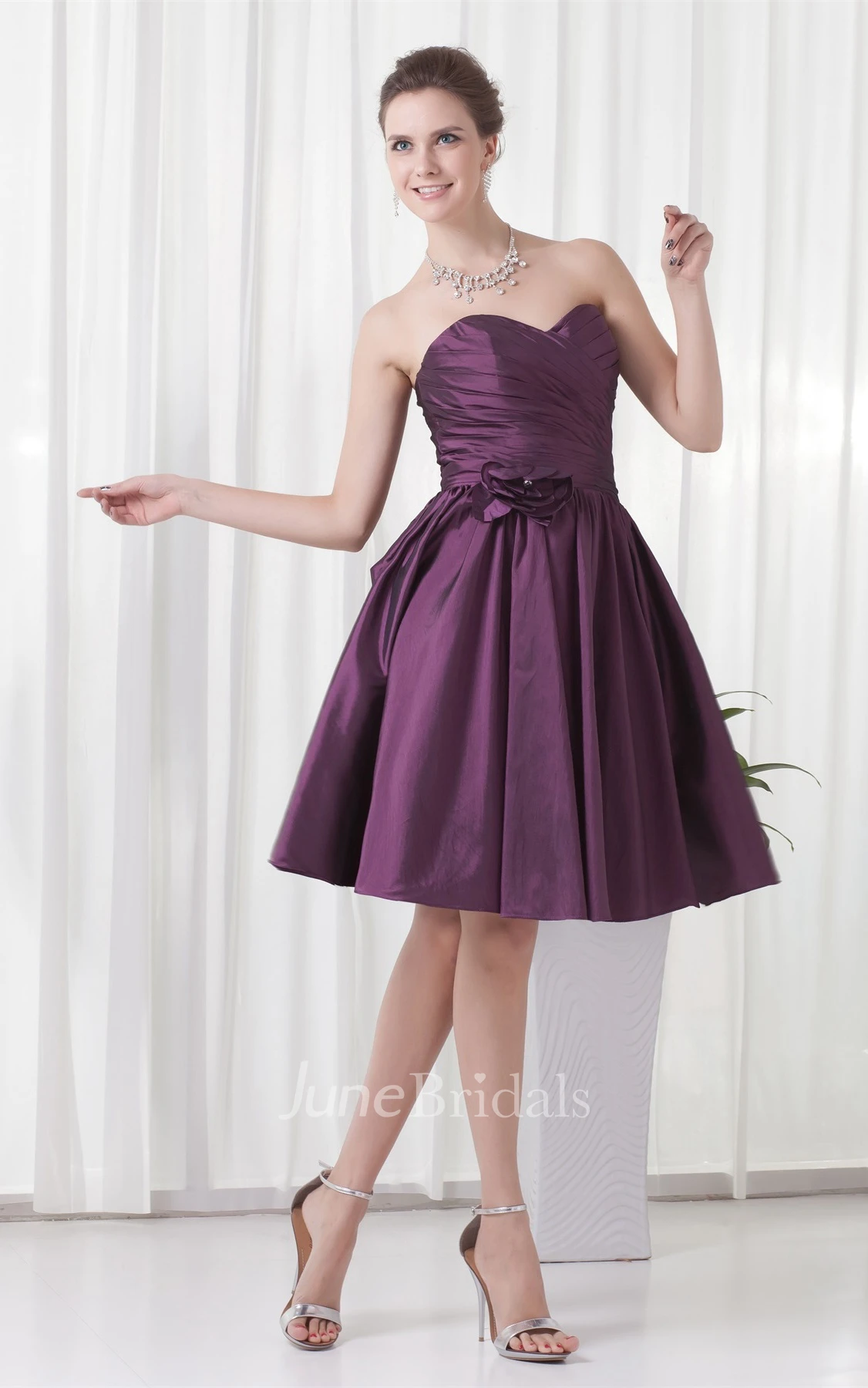 sweetheart knee-length criss-cross dress with pleats and flower