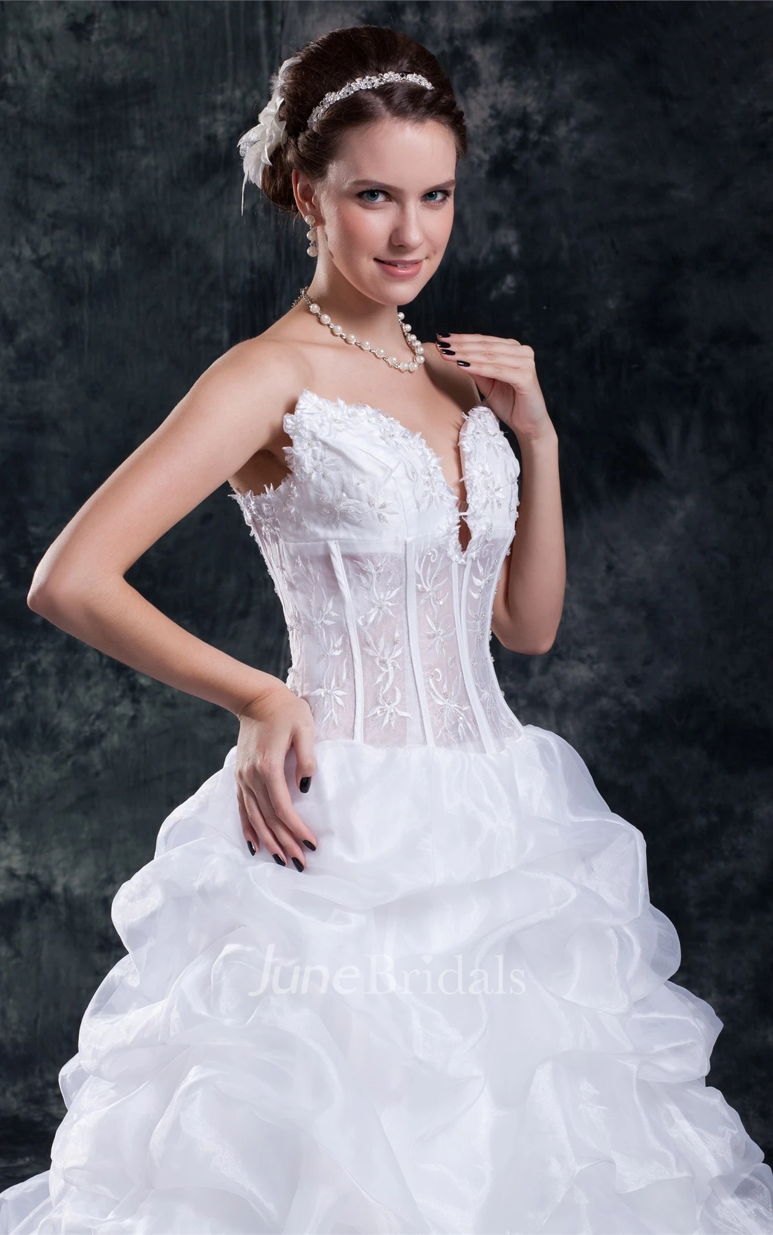 plunged ruffled ball strapless gown with embroideries