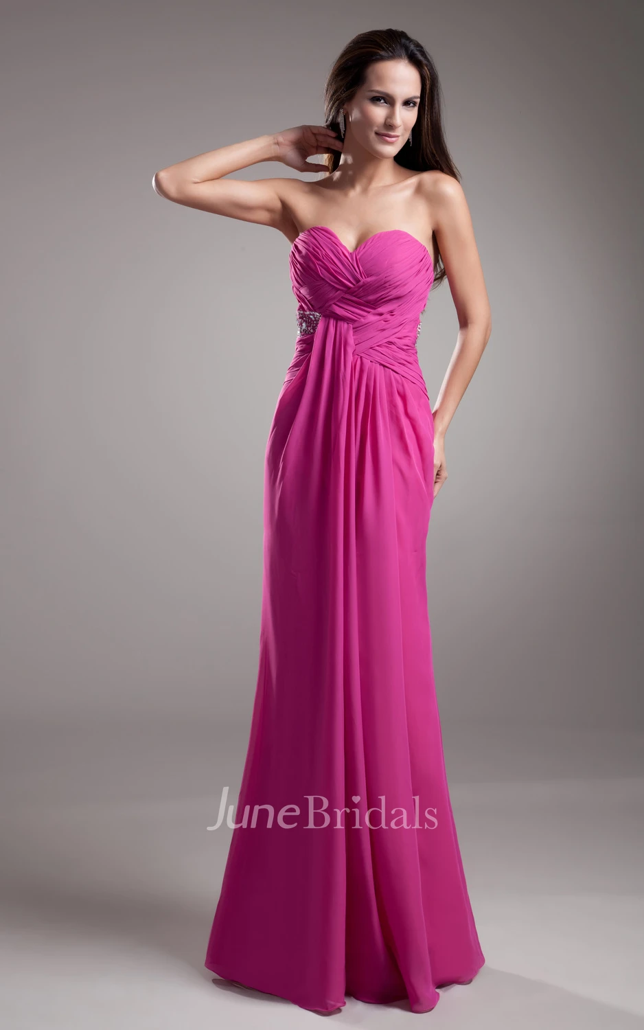 Soft Flowing Fabric Sweetheart Sleeveless Dress With Crystal Detailing And Draping