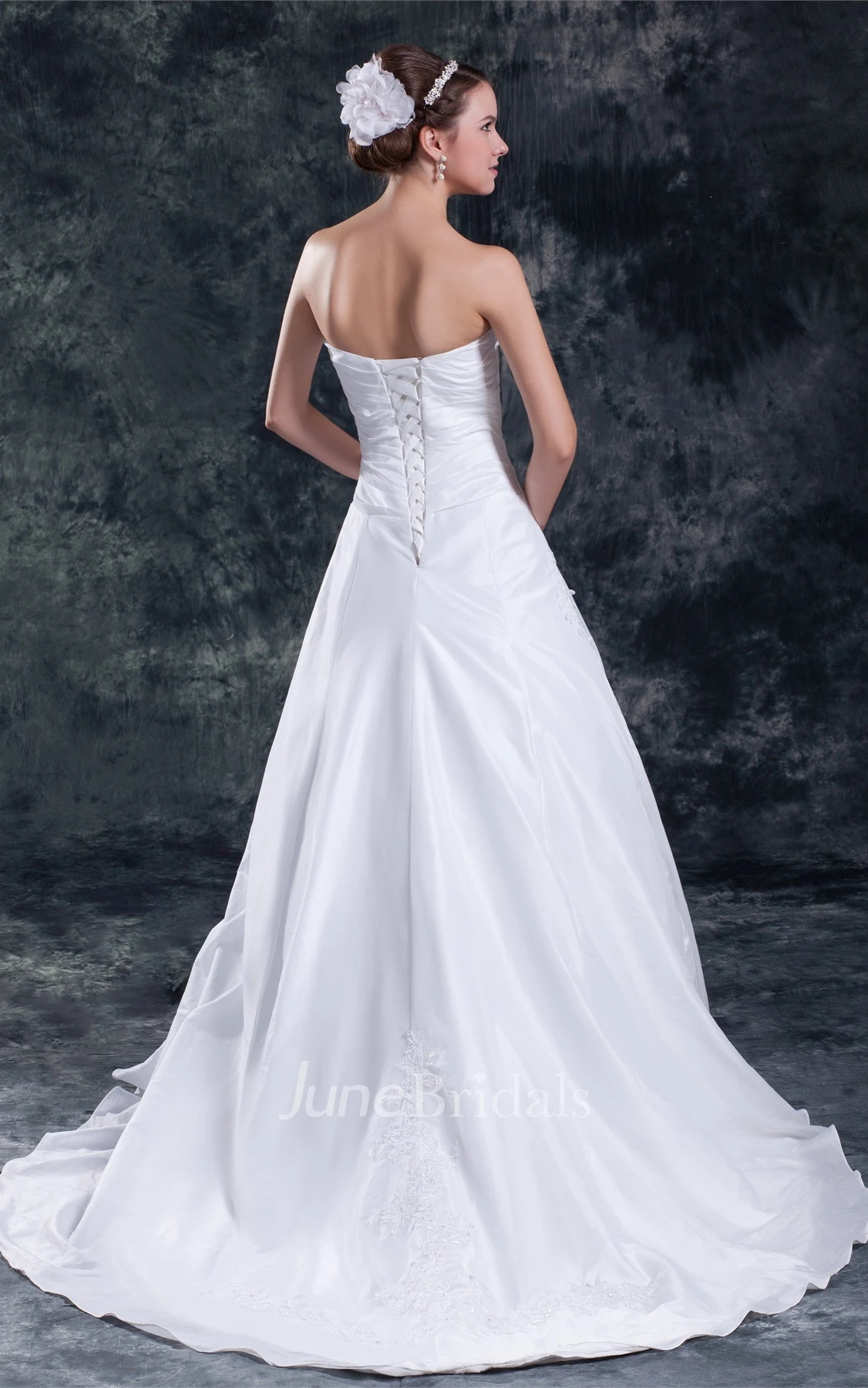 strapless a-line gown with corset back and appliques
