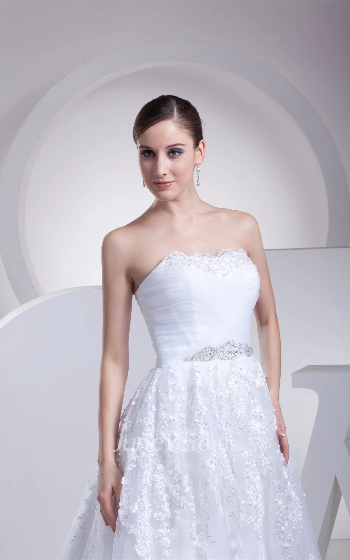 Strapless Ruched A-Line Gown with Appliques and Gemmed Waist