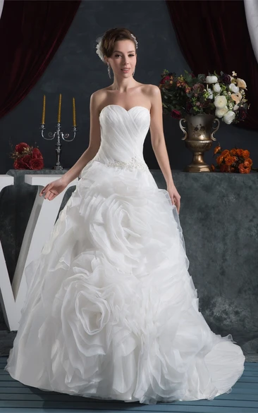 Sweetheart Criss-Cross Ball Gown with Ruffled Skirt and Stress