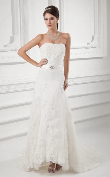 strapless maxi lace dress with court train and broach