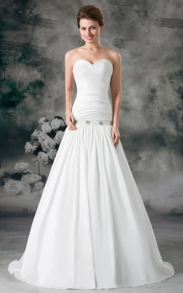 Wedding dresses with shop ruching and dropped waist