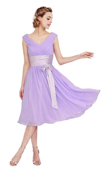 Cap-sleeved V-neck A-line Dress With Bow and Pleats