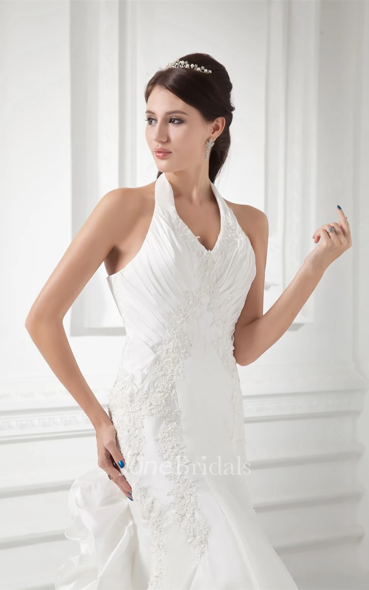 haltered a-line sleeveless gown with appliques and ruching