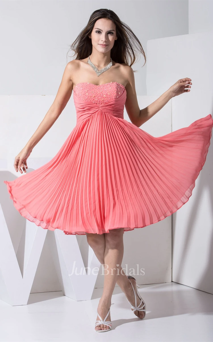 Lovely Sweetheart Knee-Length Beaded Gown with Ruching and Pleats