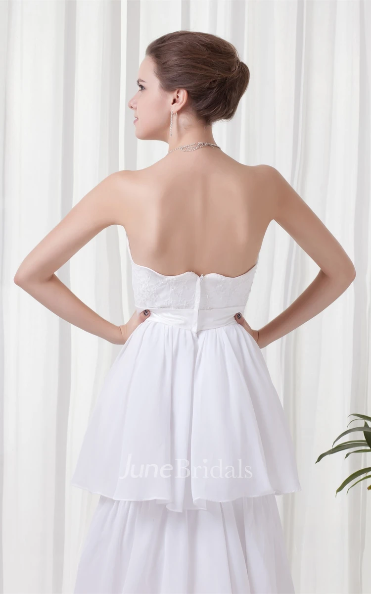 strapless tiered a-line dress with appliques and bow