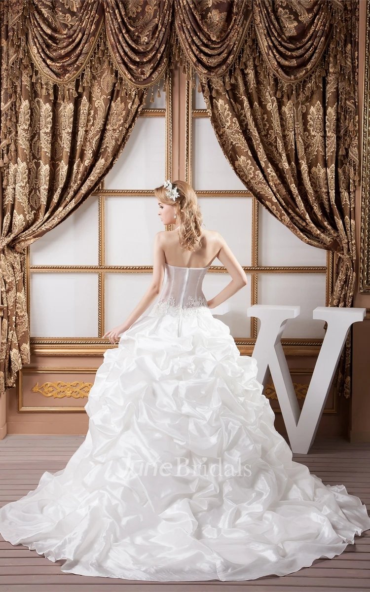 Deep-V-Neck Pick-Up Ruffled Gown with Appliques and Illusion Waist