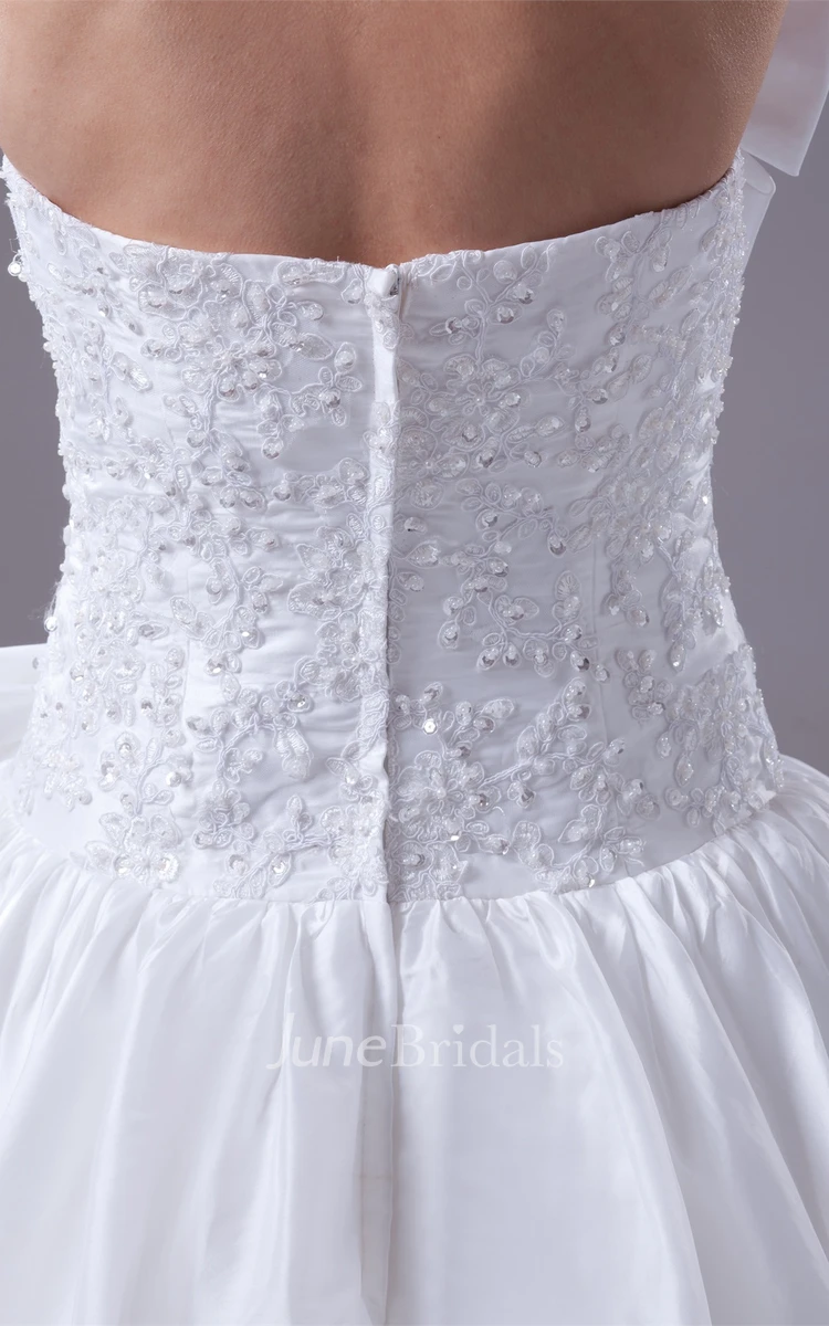 Strapless Pick-Up Tiered Ball Gown with Appliques and Bow