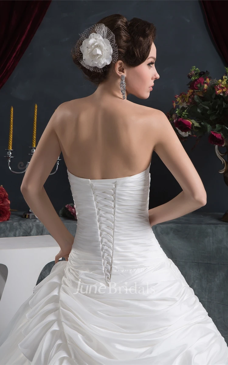 Strapless Side-Ruched Ball Gown with Broach and Flower