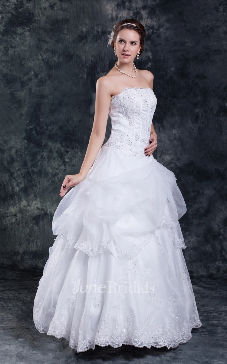 strapless a-line lace gown with beading and ruffles