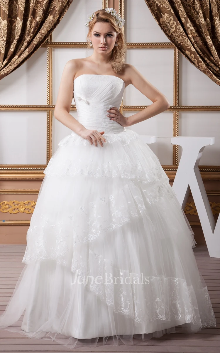 Strapless Tulle Ball Gown with Peplum and Appliques