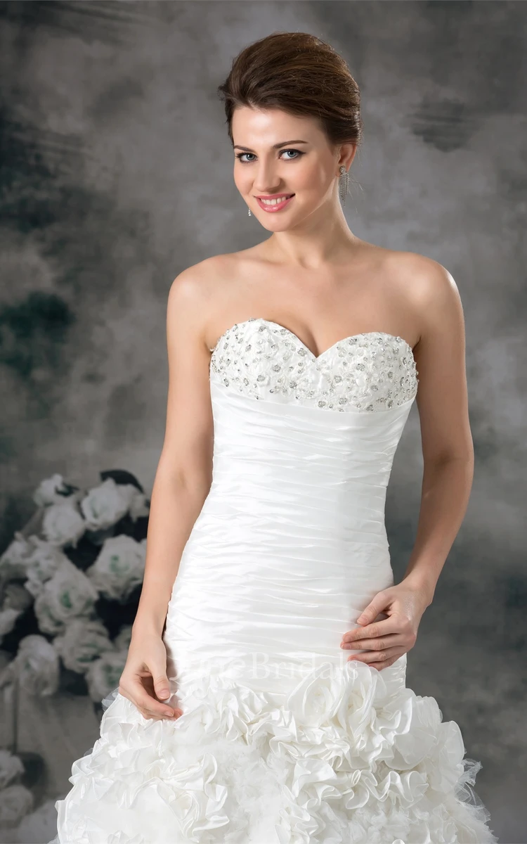 sweetheart a-line ruched dress with ruffled skirt and beading