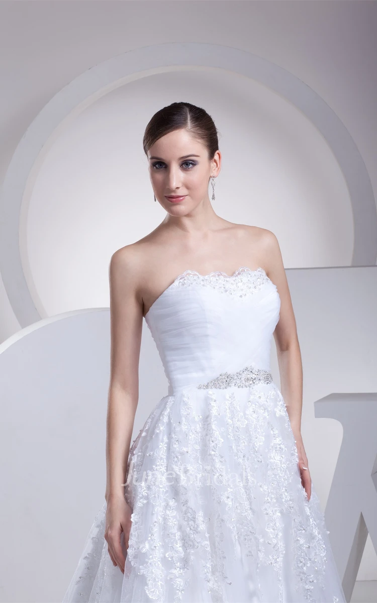 Strapless Ruched A-Line Gown with Appliques and Gemmed Waist