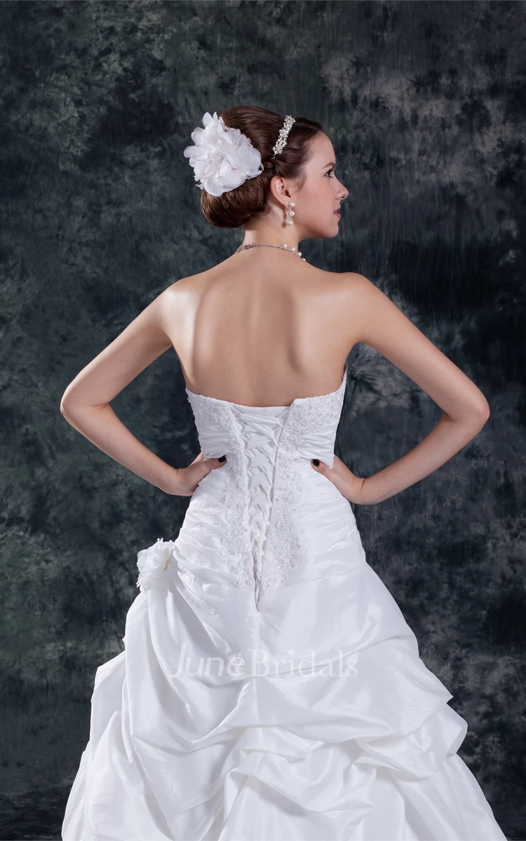 sweetheart a-line pick-up gown with ruched waist and appliques