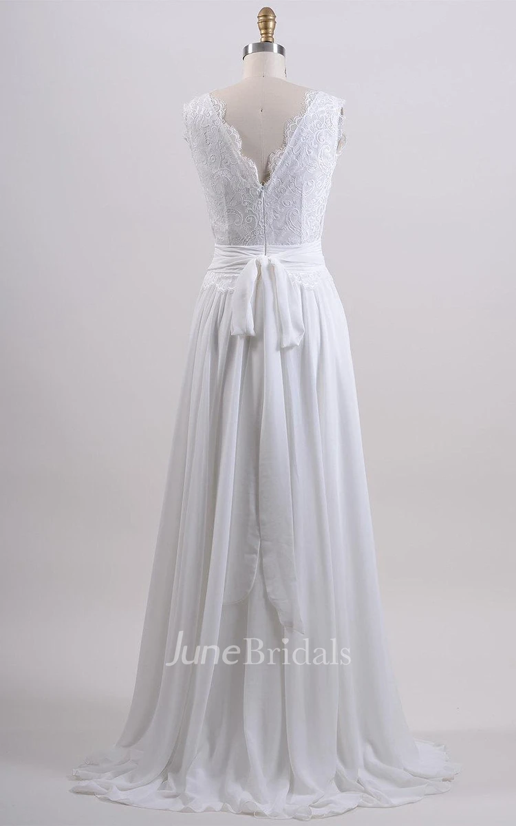 Sleeveless Alencon Lace Bridal Gown With Low-V Back and Chiffon Skirt.
