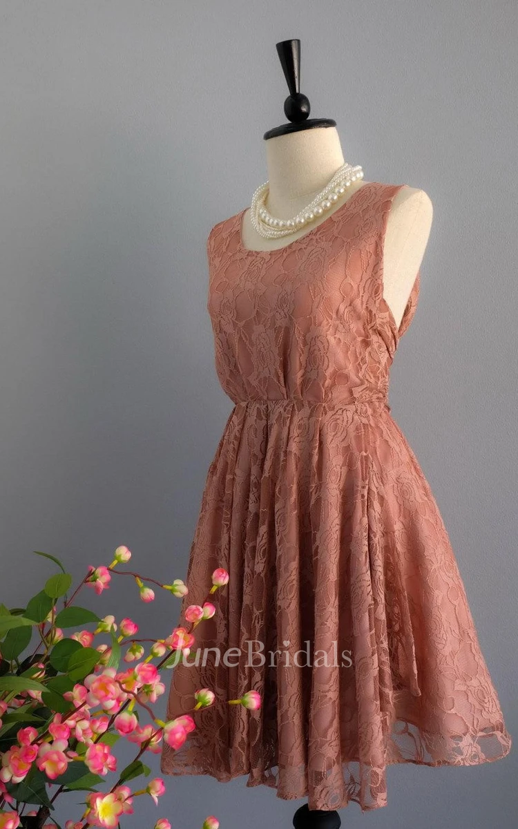 Sleeveless Lace Dress With Low-V Back And Bow