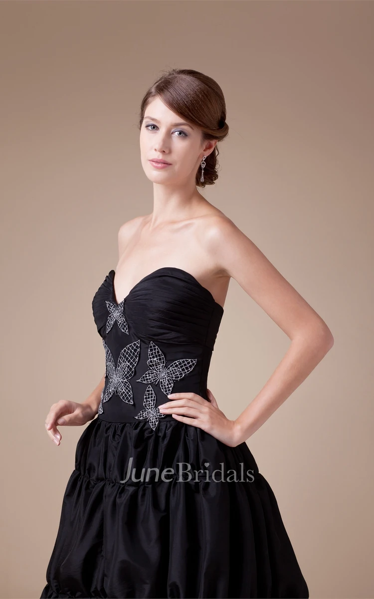 Sweetheart Ruffled A-Line Gown with Beaded Butterfly Design